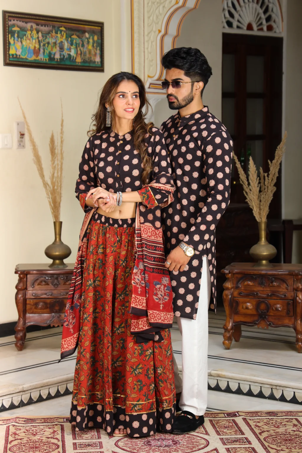 red-black lehenga choli couple look