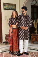 red-black lehenga choli couple side view
